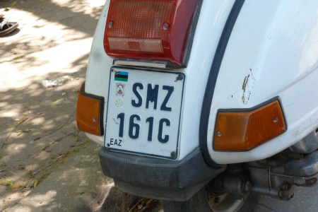 Current government issues have developed to three numerals and a serial letters, presumably because the previous system reached 9999.    There are hundreds of Vespas in Zanzibar - far more than there are light motorcycles, which woud have thought were much more suitable for the poor roads......   SMZ 151 C here/