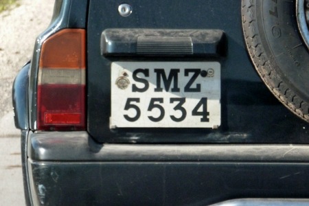 In the case of the island government plates, there are still examples of the pre-2010 to be seen, as here with SMZ 5534, the letters abbreviating the Swahili for 'Revolutionary Government of Zanzibar'.     The island has a measure of self-government separate from Tanganyika, its mainland partner in Tanzania; mainland government plates also circulate on the island and these are of the Tanzanian Union format, usable in either place.    It is said that Zanzibar vehicles may not be used on the mainland, unless they change to the T-prefix Tanganyika type. 