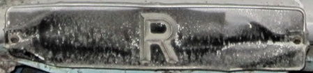 R = Resident.   A Bluemels-manufactured plate for Zanzibar.